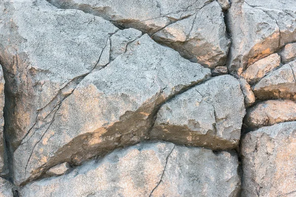 Arka plan için kaya yüzey dokusu. büyük taş.