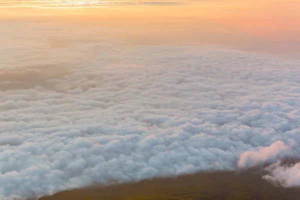 Beautiful sunrise seen from the top of the Mount Fuji, Japan. The morning light is called goraiko, \