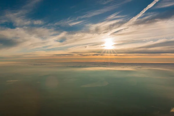 Beautiful sunrise seen from the top of the Mount Fuji, Japan. The morning light is called goraiko, \