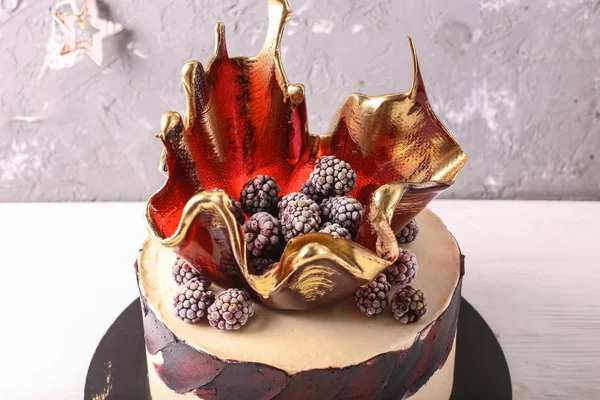 Chocolate cake with berries.Delicious ice cream cake with frozen berries , selective focus