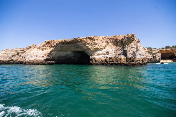 Rocks, cliffs and ocean landscape at coast in AAlgarve, Portugal