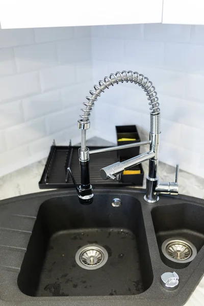 Fancy sink in a mostly white modern kitchen — Stock Photo, Image