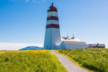 Alesund, Norveç yakınlarındaki Godoy Adası 'nda açık havada Alnes deniz feneri.