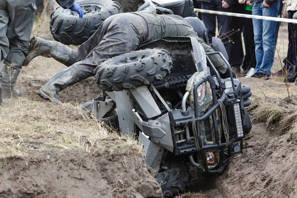 Racing on a dirt atv.