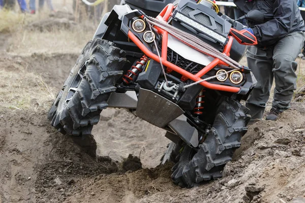 Racing on a dirt atv.