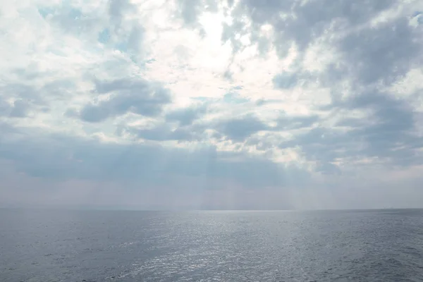 A beautiful sea. Cloudy sky and calm sea. Photo of an amazing nature.