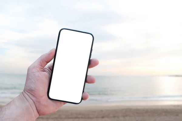 Mockup Technology Muž Drží Ruce Smartphone Zblízka Bílou Obrazovkou Pozadí — Stock fotografie