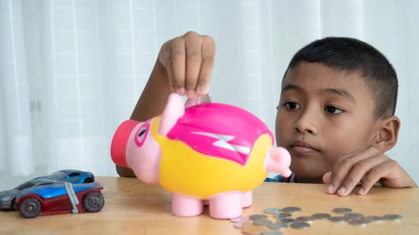 Cute Little Asian Boy Piggy Bank — Stock Photo, Image