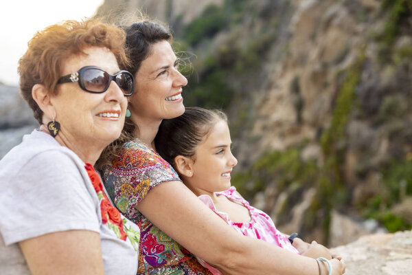 Three generations of women. Grandmother, mother, daughter and gr