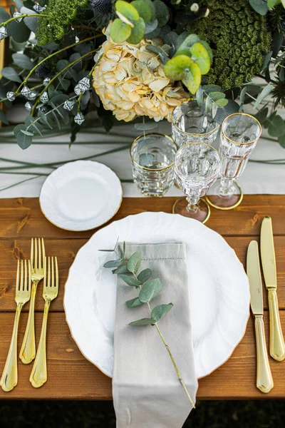 stock image Decorated plate with fork and spoon. Table set up in boho style with pampas grass and greenery