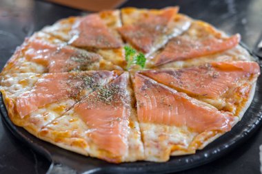 Somon pizza masaya yakın.