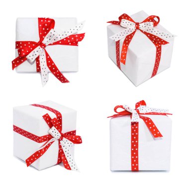 Kırmızı kurdeleli beyaz hediye kutusu.