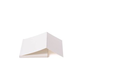 Bir kitap üzerinde beyaz bir yüzeye karşı doğrudan yalan. Foreshorten. Metin için fazla yer. Kullanım tipografi ürünleri ve yazı tipleri için.