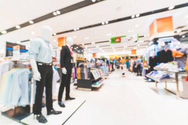 Bulanık, ufuk Erkek Giyim Mağazalar modern alışveriş merkezi veya alışveriş arka plan. Alışverişkoliğin yaşam tarzı ya da moda outlet iş kavramı