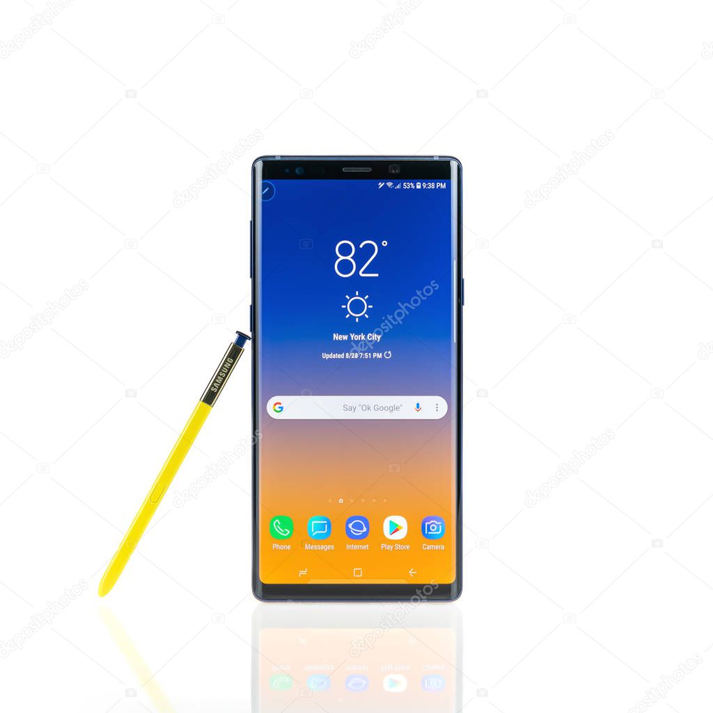 Bangkok, Thailand - Aug 28, 2018: Studio shot of the new Samsung Galaxy Note 9 smartphone in ocean blue color with yellow S-Pen stylus, isolated on white background. Illustrative editorial content.