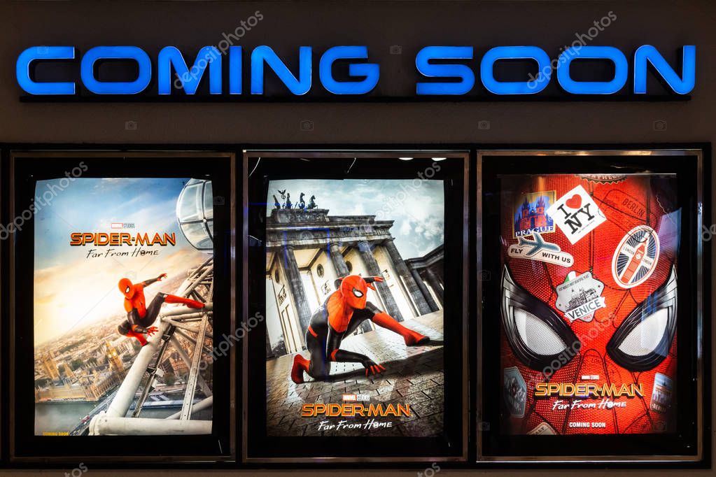 Bangkok, Thailand - Jun 26, 2019: Spider-Man: Far From Home movie poster with coming soon display showing in theatre. Cinema promotional advertisement, or film industry marketing concept
