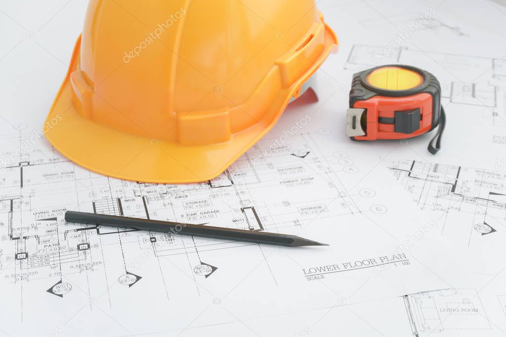 Architects workplace - architectural tools, blueprints, helmet, measuring tape, Construction concept. Engineering tools. Top view