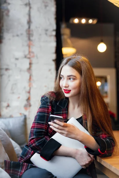 Woman Work In Cafe On Her Laptop. Portrait Of Stylish Smiling Woman In Winter Clothes And Work At Laptop. Female Winter Style. - Image