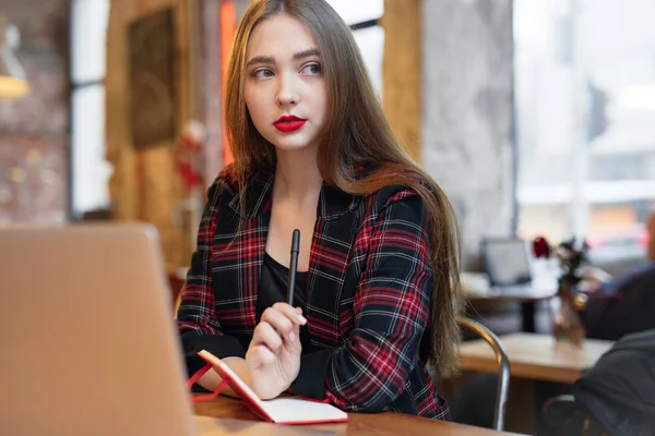 Woman Work In Cafe On Her Laptop. Portrait Of Stylish Smiling Woman In Winter Clothes And Work At Laptop. Female Winter Style. - Image