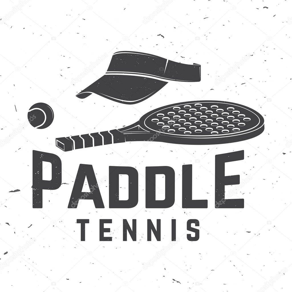 Paddle tennis badge, emblem or sign. Vector illustration. Concept for shirt, print, stamp or tee. Vintage typography design with paddle tennis racket, visor and paddle ball silhouette.