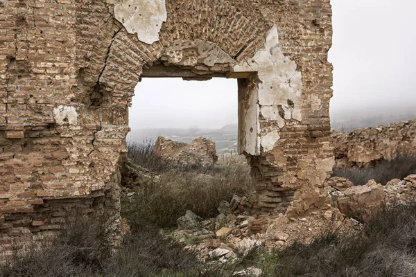 View of ruins and buildings in a village, seen in Belchite, province of Aragon.