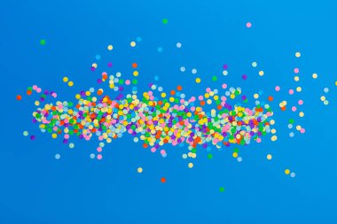 mavi arka plan üzerinde renkli konfeti. 