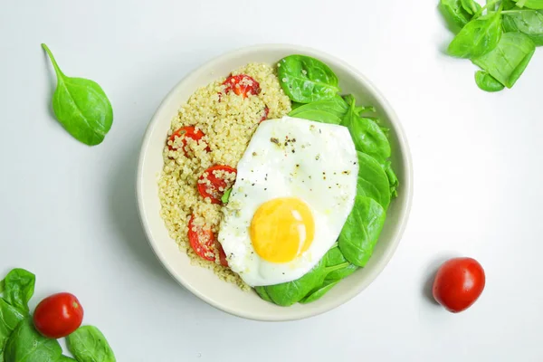Savory Breakfast Quinoa Spinach Tomatoes Fried Eggs Healthy Food White — Stock Photo, Image