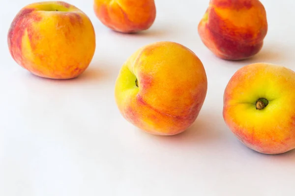 Peaches  on white background. Close up