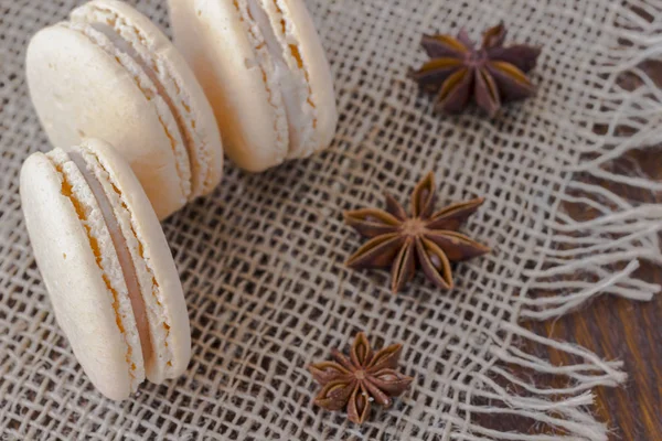 Macaroni cake and star anise  on sackcloth