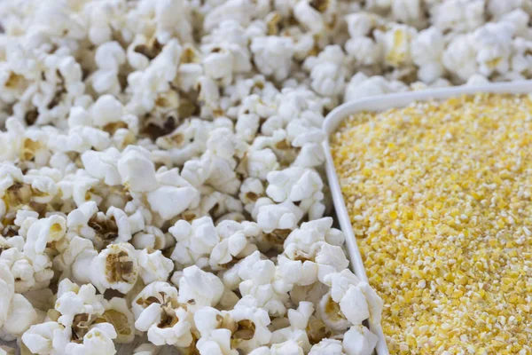 Corn products: corn grits and popcorn, close-up