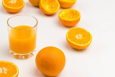 Orange juice, Oranges  for Healthy Diet Snack. White background. Top view. 