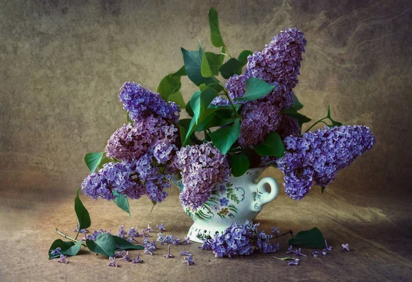 minimalist still life lilac in a vase