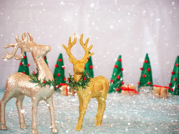 Christmas or Happy New Year background with deers, christmas trees and gift boxes — Φωτογραφία Αρχείου