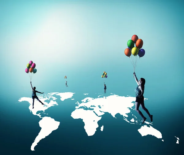 Woman flying with baloons over world map