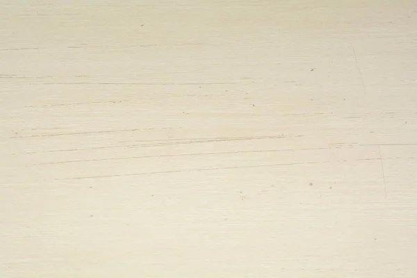 Krem ahşap malzeme, soyut arka plan üzerinde çizikdoku. Çizik krem ahşap yüzey arka plan.