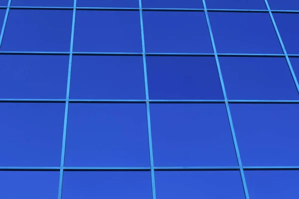 Skyscraper finance building blue glass windows — Stock Photo, Image