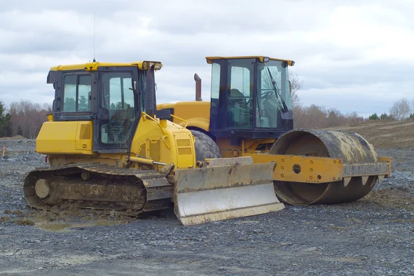 Paving construction site bulldoser steamroller asphalting industry — Stok Foto