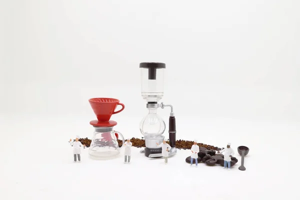 the tiny figure of Professional coffee maker