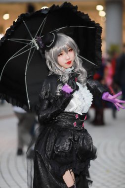 kimliği belirsiz Japon anime cosplay poz, 2018