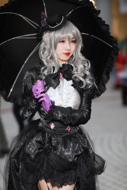 kimliği belirsiz Japon anime cosplay poz, 2018