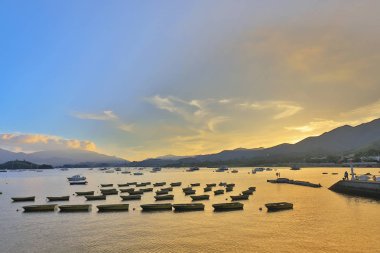 Tai Mei Tuk, Hong Kon içinde deniz günbatımı