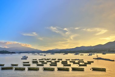 Tai Mei Tuk, Hong Kon içinde deniz günbatımı