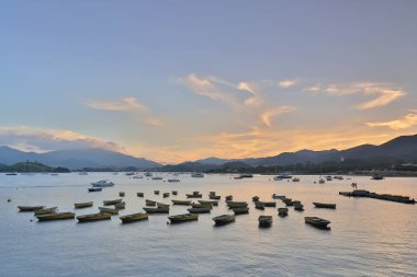 Tai Mei Tuk, Hong Kon içinde deniz günbatımı