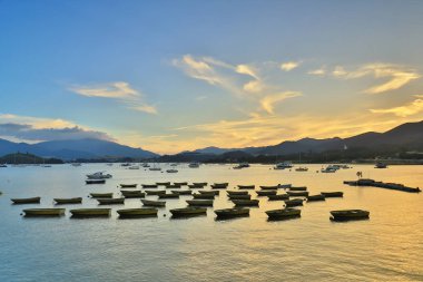 Tai Mei Tuk, Hong Kon içinde deniz günbatımı