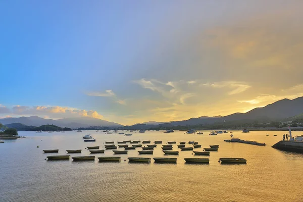 Tai Mei Tuk, Hong Kon içinde deniz günbatımı