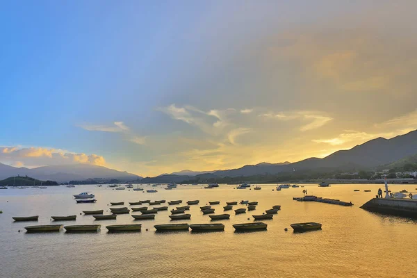Tai Mei Tuk, Hong Kon içinde deniz günbatımı