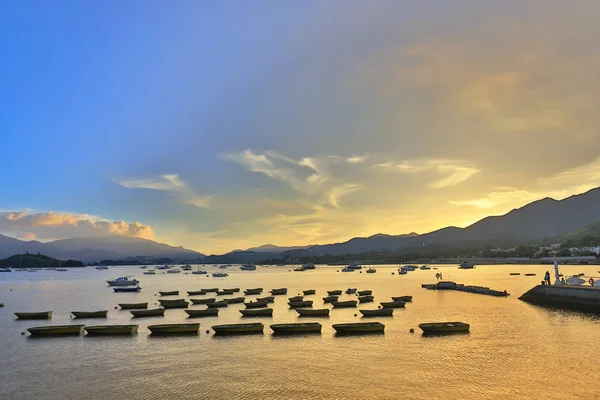 Tai Mei Tuk, Hong Kon içinde deniz günbatımı