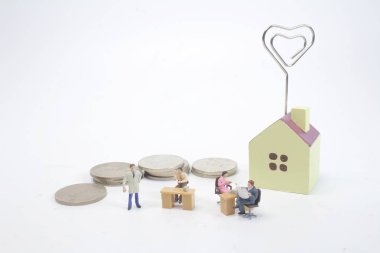 İş takım toplantısı sikke yığını ve evleri. 