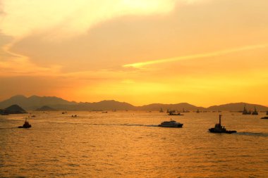Güneş Batı kowloon promenade, hong kong ayarla