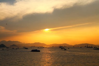 Güneş Batı kowloon promenade, hong kong ayarla
